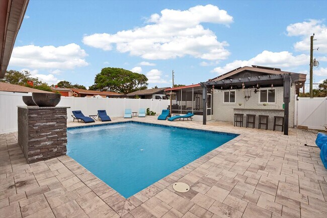 Building Photo - Beachside Pool Home Just Minutes from the Ocean!
