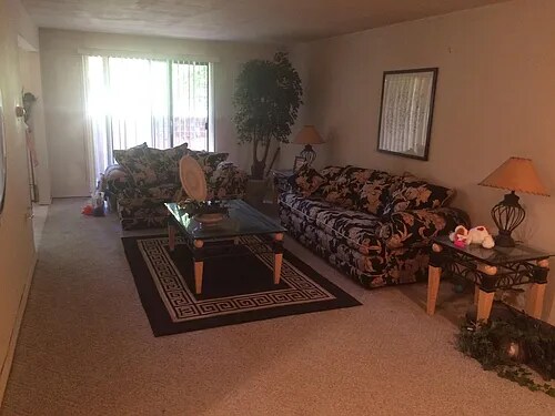 Large Living Room leading out to Patio - 62 Country Club Ln