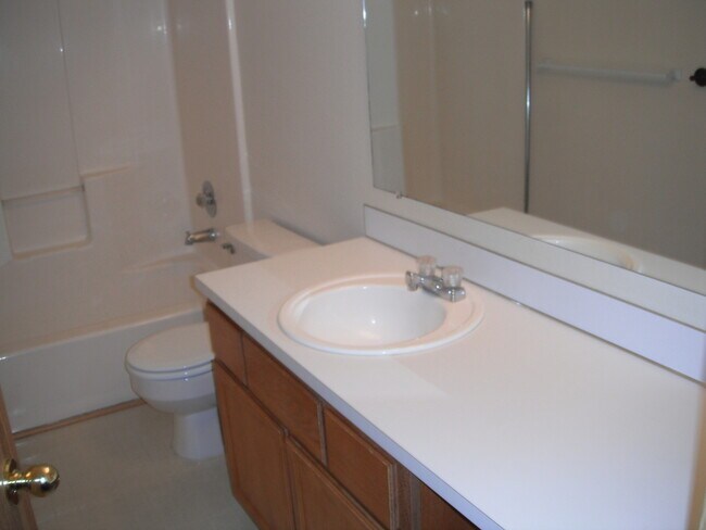 Building Photo - Huge deck, triple car garage/RV parking, storage