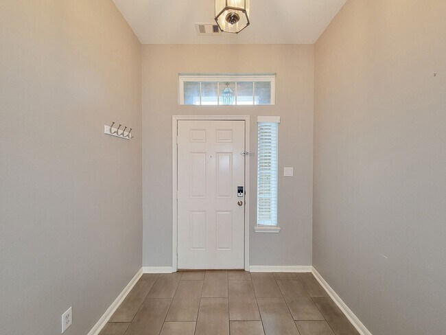 Building Photo - Welcome to this charming one-story home fe...