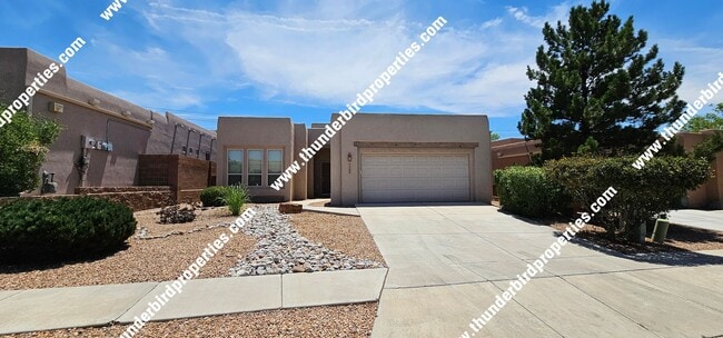 Building Photo - Beautiful and Spacious in NE Heights Gated...