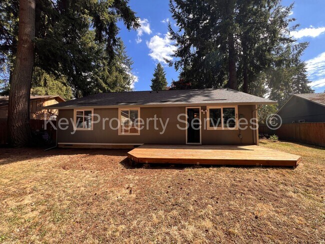 Building Photo - Orchards Ranch with Large Fenced Yard - Re...