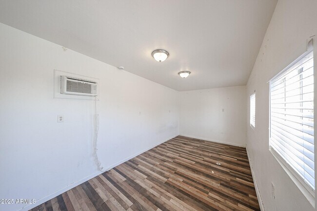 Building Photo - 3408 W Port Au Prince Ln