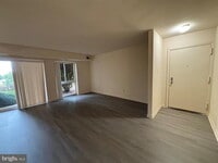 Building Photo - Charming Edsall Bluff Condo: Your Alexandria Oasis