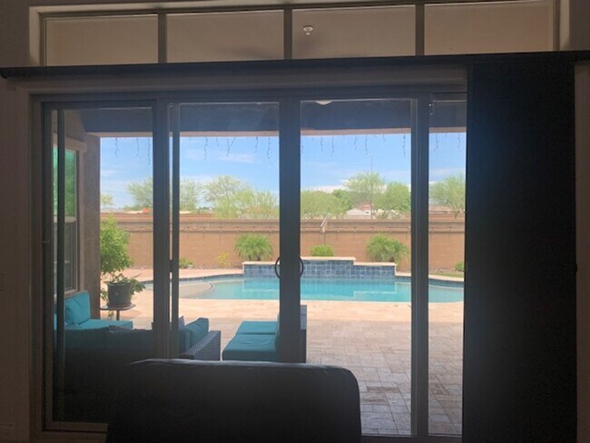 Building Photo - Gorgeous 5 Bed 3.5 Bath 3 Car garage home with private pool + SOLAR in gated community in Peoria