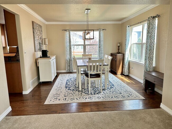 Building Photo - Elegant & Spacious 4BD Home with 3-Car Gar...
