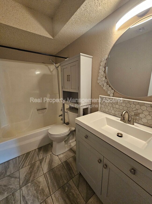 Building Photo - 7710 N 120th Ave E