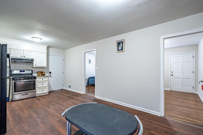 Building Photo - The Forest Haven | Large Forest Haven home with a spacious yard and deck, conveniently located ju...