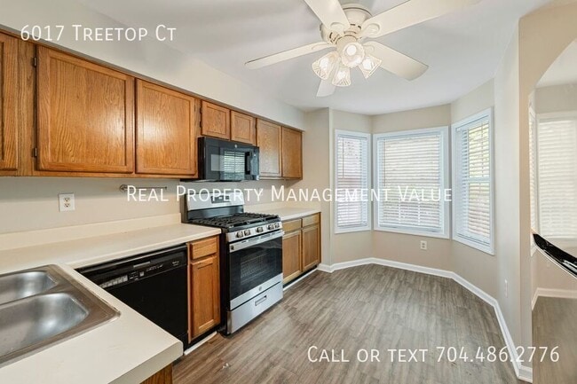 Building Photo - 6017 Treetop Ct