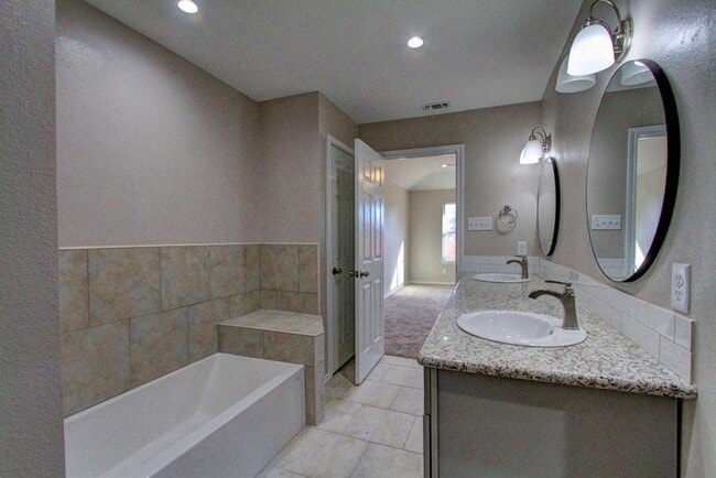 Building Photo - COMING SOON - 4 Bedroom Home + 2 Car Garage and Privacy Fenced Backyard!