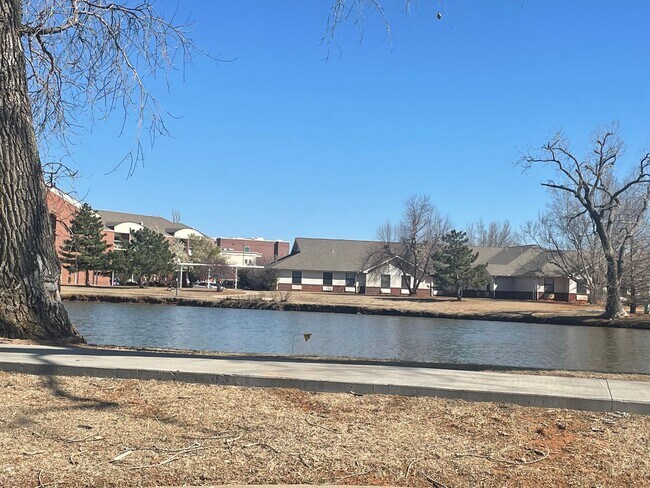 Building Photo - 55 and up community!!  2 bed flex floorplan with office, bright natural light throughout, 2 car g...