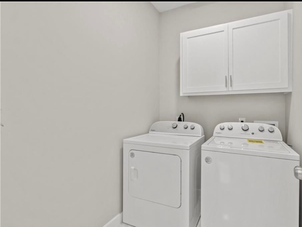 Spacious laundry room with washer and dryer - 2513 E Israel Ave