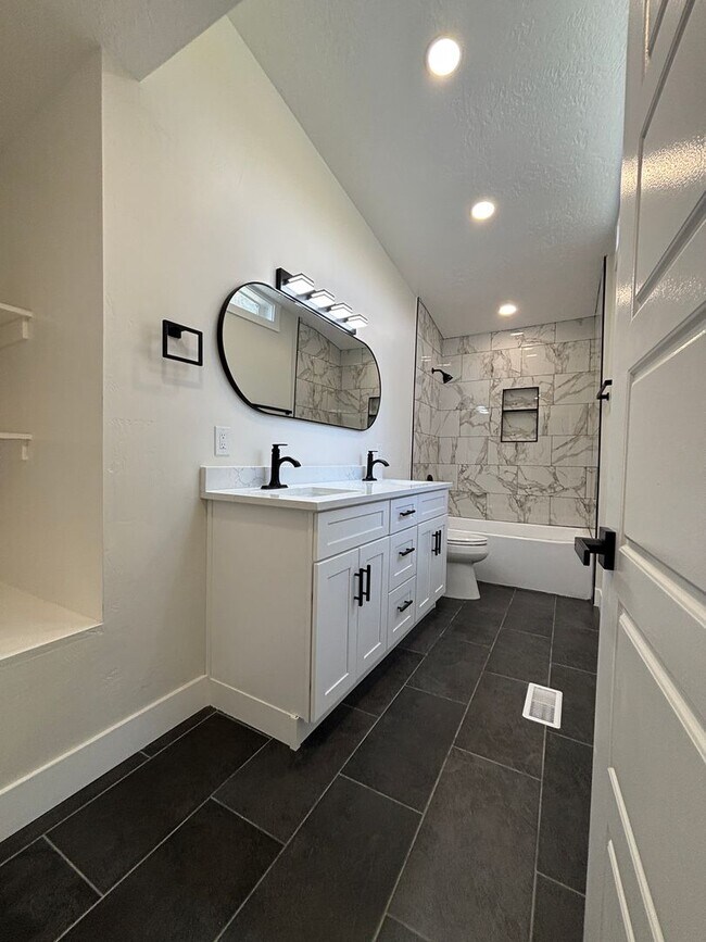 Building Photo - Beautifully Renovated 4-Bedroom Home with Finished Basement