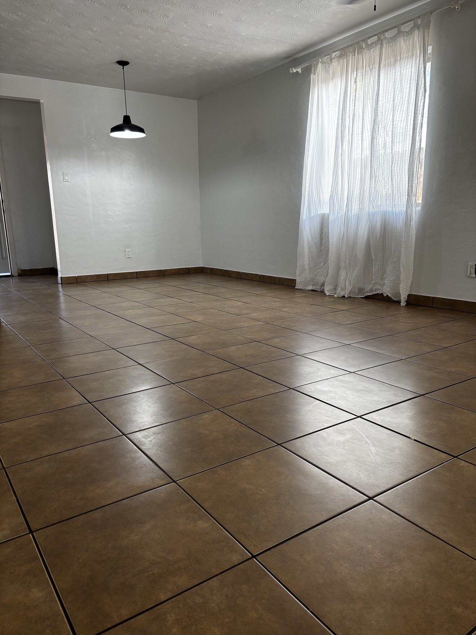 Tile and wood floors! No carpet! - 3030 W Marshall Ave