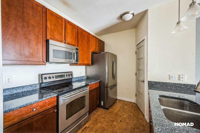 Building Photo - Charming 2BR Condo in Denver