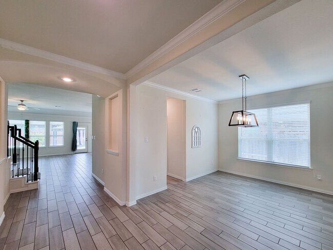 Building Photo - This thoughtfully designed home boasts 4 spacious bedrooms (2 down) and 3.5 baths, providing ampl...
