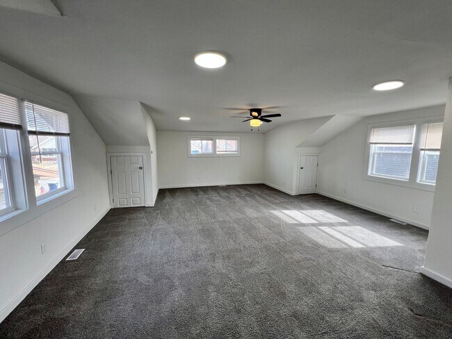 Building Photo - Updated 5BR Home with Modern Finishes & Extra Space