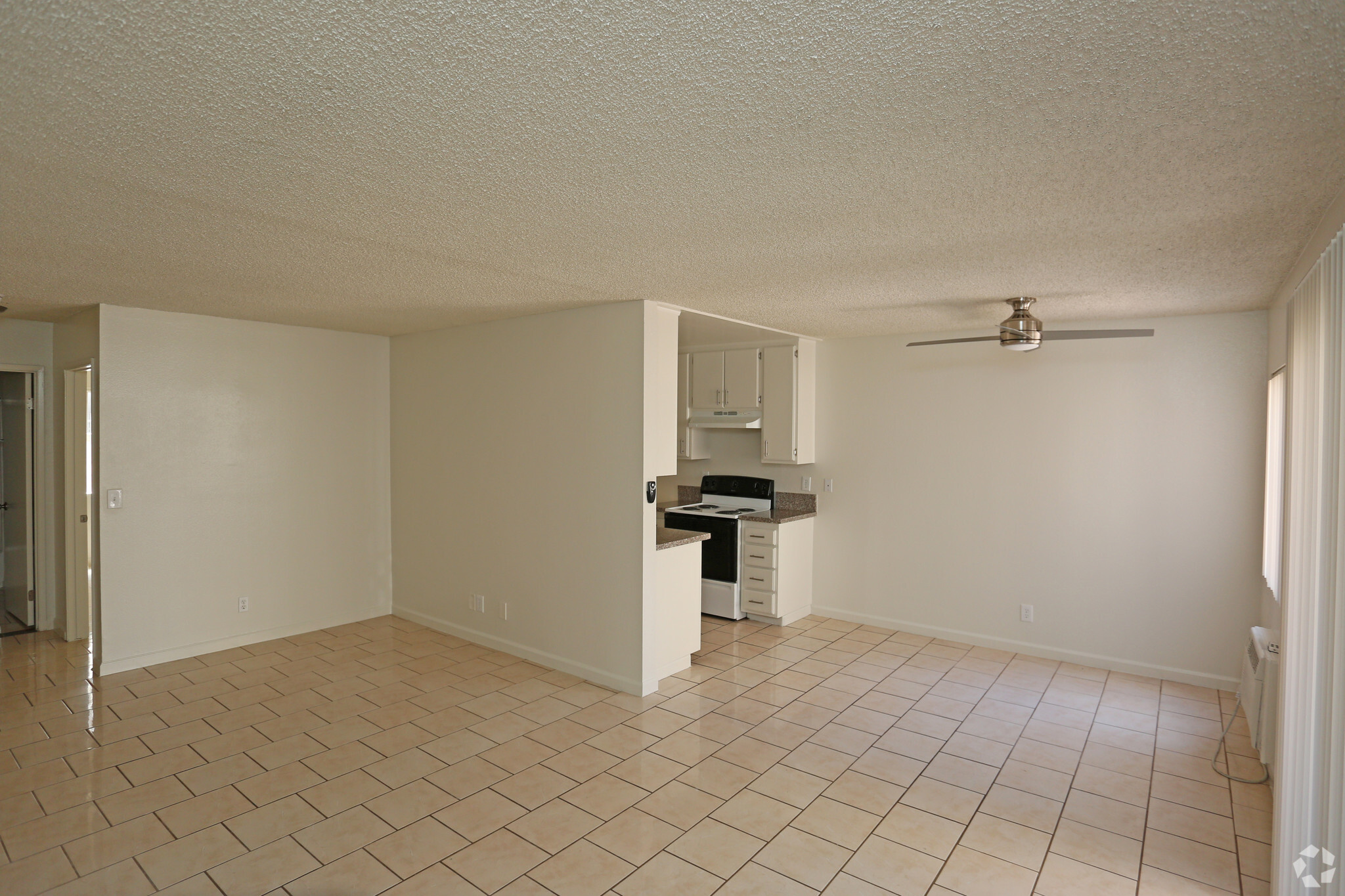 1BA/1BR Living Area - Commerce Terrace Apartments