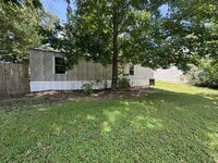 Building Photo - Easy, low-maintenance living in this well-...