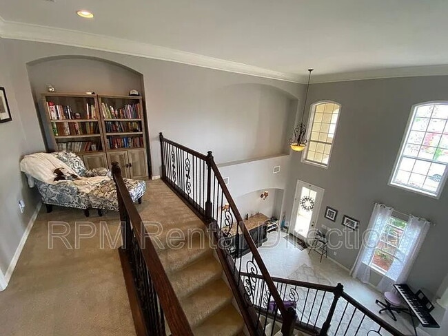 Building Photo - 4-Bedroom W/Den Lakefront Pool Home with Spa in Gated Promenade East at The Forum