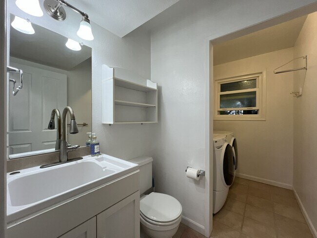 Building Photo - Three-Bedroom Home Near Nike Campus with Bonus Room, Large Deck & Two-Car Garage