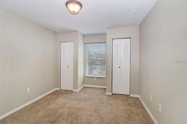 Building Photo - 9506 Lake Chase Island Way