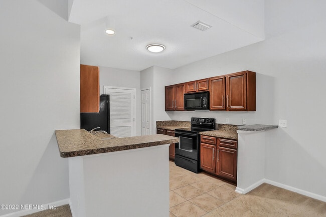 Building Photo - 8241 Pelican Landing Rd