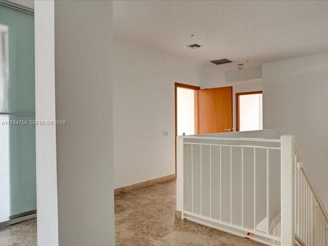 Building Photo - 9499 Collins Ave