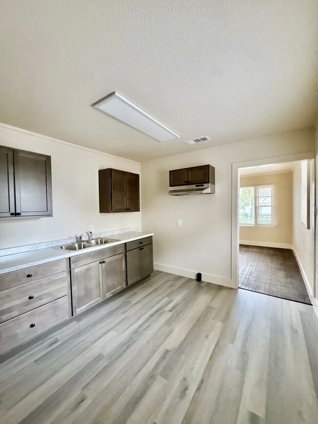 Building Photo - Welcome Home! Cozy 2 Bedroom, 1 Bath Charmer with a Brand-New Kitchen