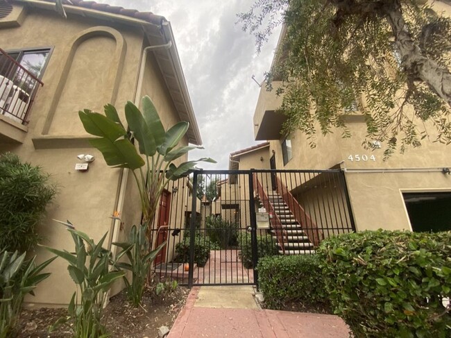 Building Photo - Updated condominium in a quiet gated commu...