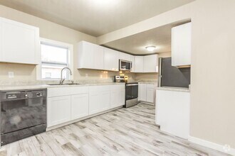Building Photo - Updated 3 bedroom with detached garage