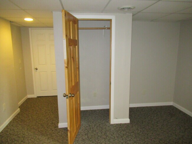 basement bedroom 3 closet then door to bathroom - 48 Sherman Pl