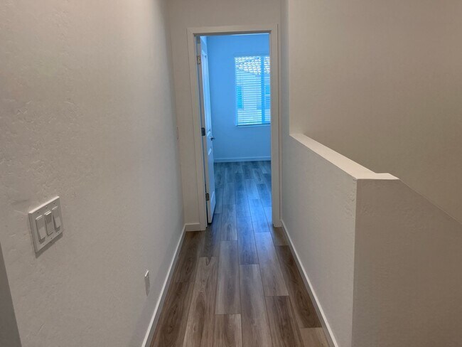 Building Photo - TOWN HOME WITH COMMUNITY POOL , GATED COMM...