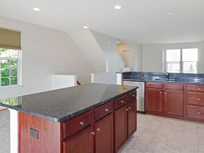 Building Photo - Pet Friendly 3 level End Unit Town Home wi...