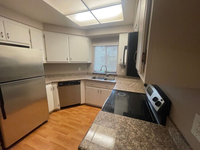 Building Photo - Remodeled 2 Bedroom 2 Bath Condo in Park-like Cedar Gables Community!