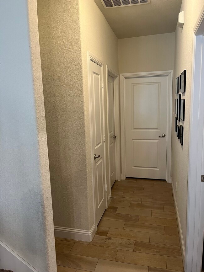 Downstairs hall to bedrooms near stairs - 136 Peace Pl