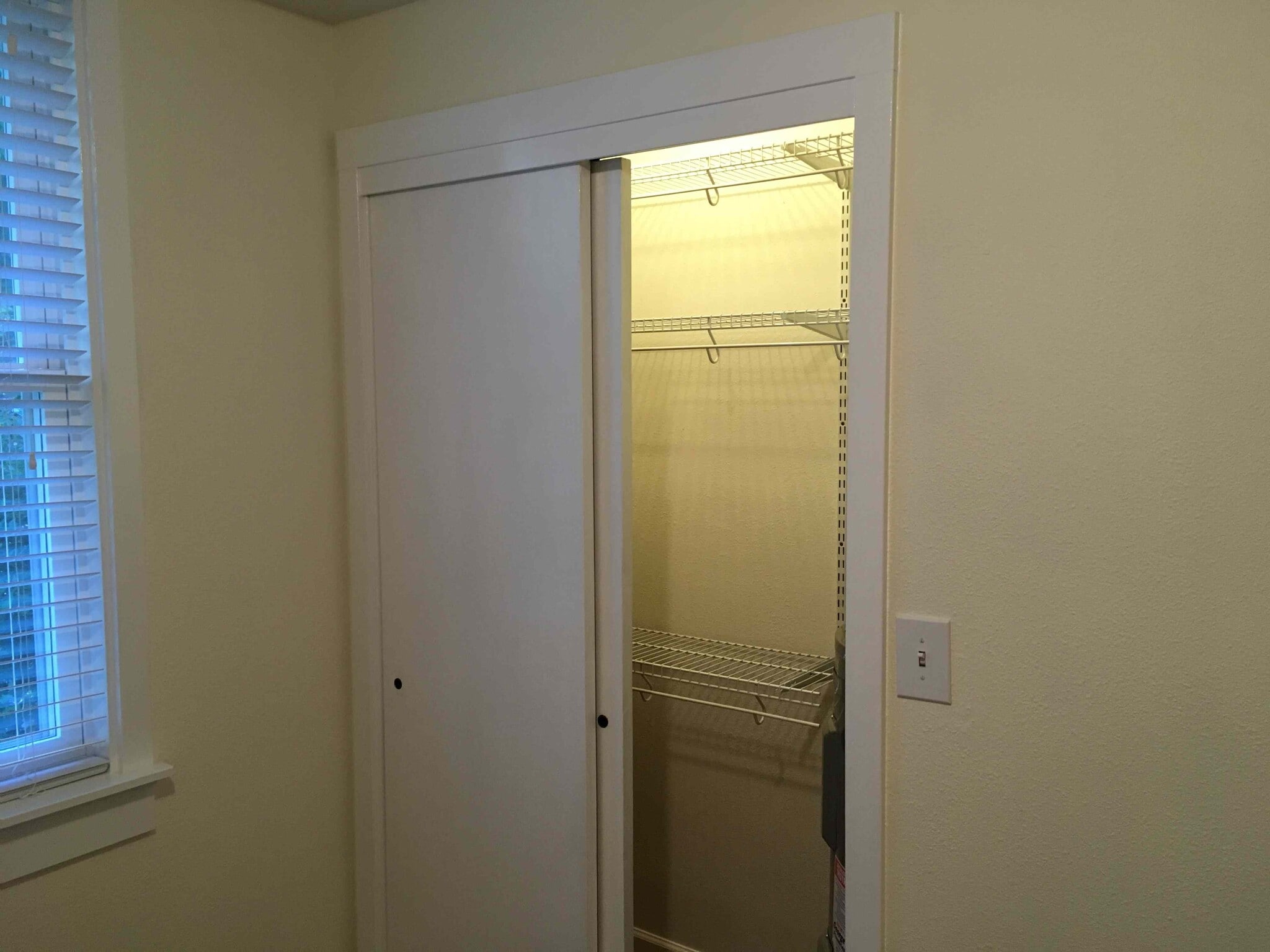 front bedroom closet open - 5007 SW Custer St