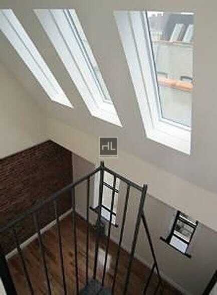 Building Photo - E 3RD ST.