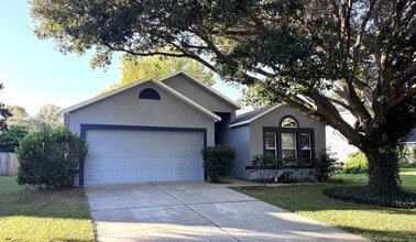 Building Photo - Beautiful 4/2 with 2 Car Garage in the Wek...