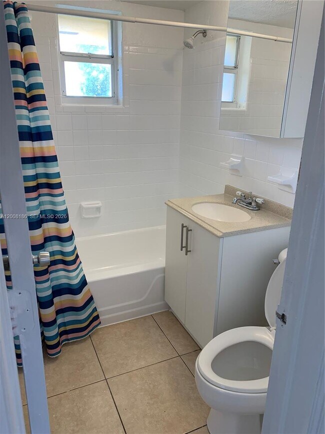 Building Photo - 241 S Royal Poinciana Blvd