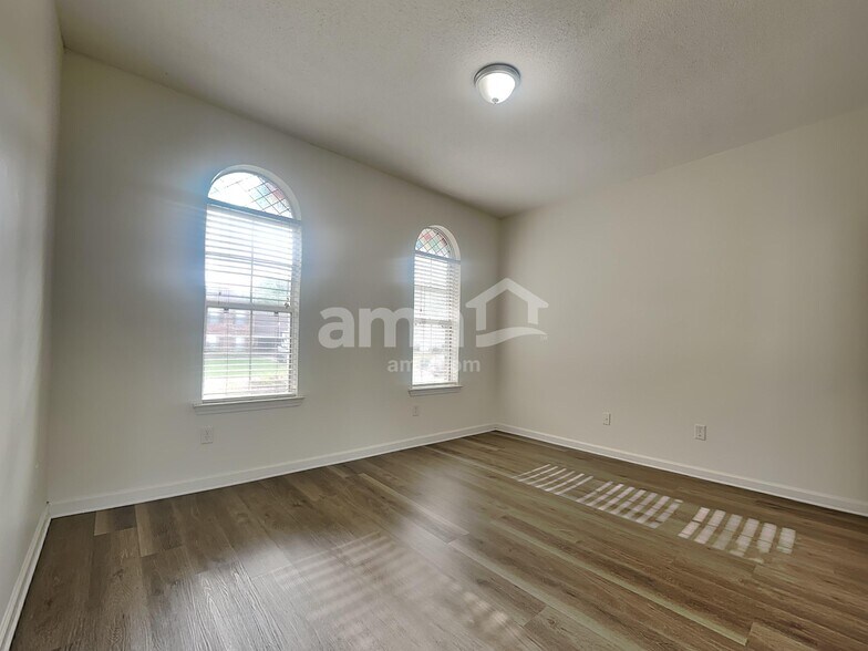 Building Photo - 7138 Arcastle Loop E