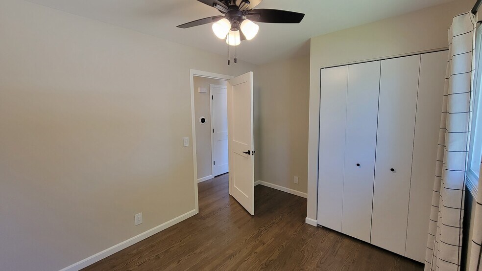 Bedroom 1. Perfect for a bedroom, nursery, bunk beds, office or craft room. 4 ft wide closet. - 6305 49th Ave