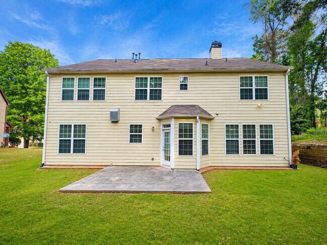 Building Photo - Clean 5 Bedroom Collins Hill Home with First Floor Suite and Oversized Master