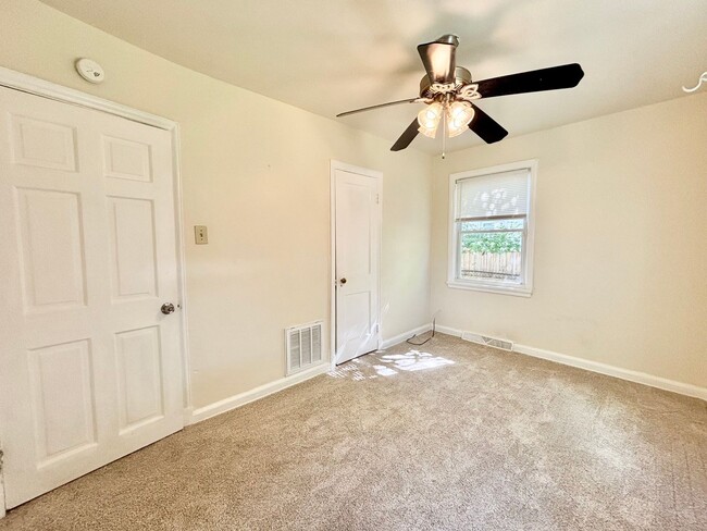 Building Photo - Cozy Home with Private Backyard & Detached...