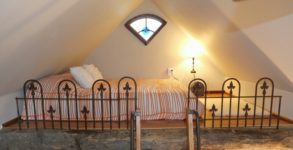 bedroom loft shown with double/full bed - 214 Page Hill Rd