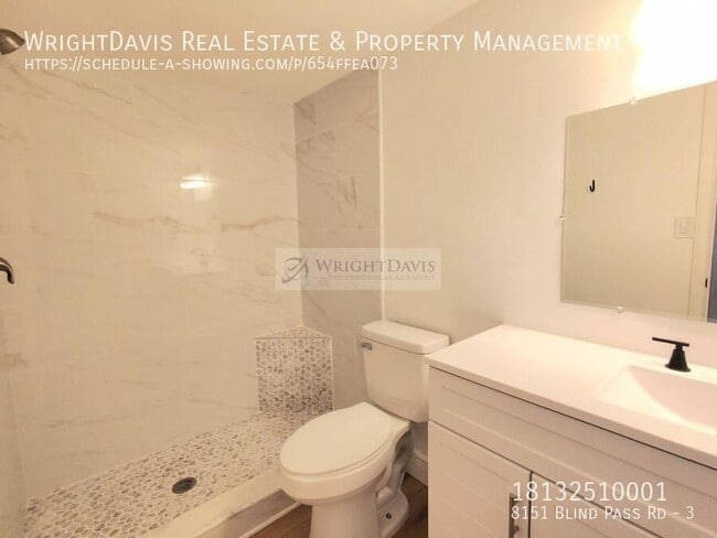 Building Photo - 8151 Blind Pass Rd