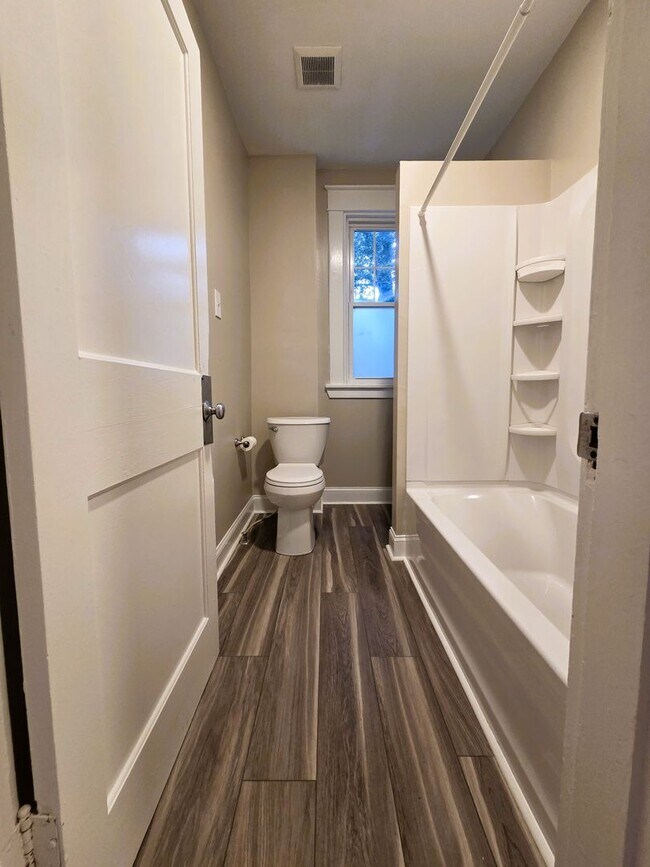 Building Photo - Renovated stately brick home in Forest Hill area on large lot.