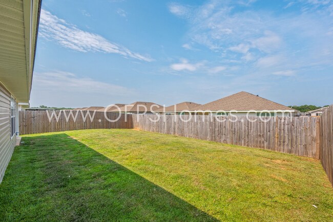 Building Photo - 4/2 in Pace Community!! AVAILABLE SEPTEMBER 2026!