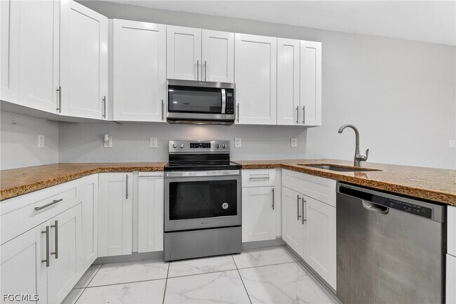 Building Photo - 702 Norman Ave N