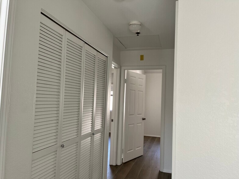 Upstairs hallway with Washer/Dryer - 1345 E Grand Ave